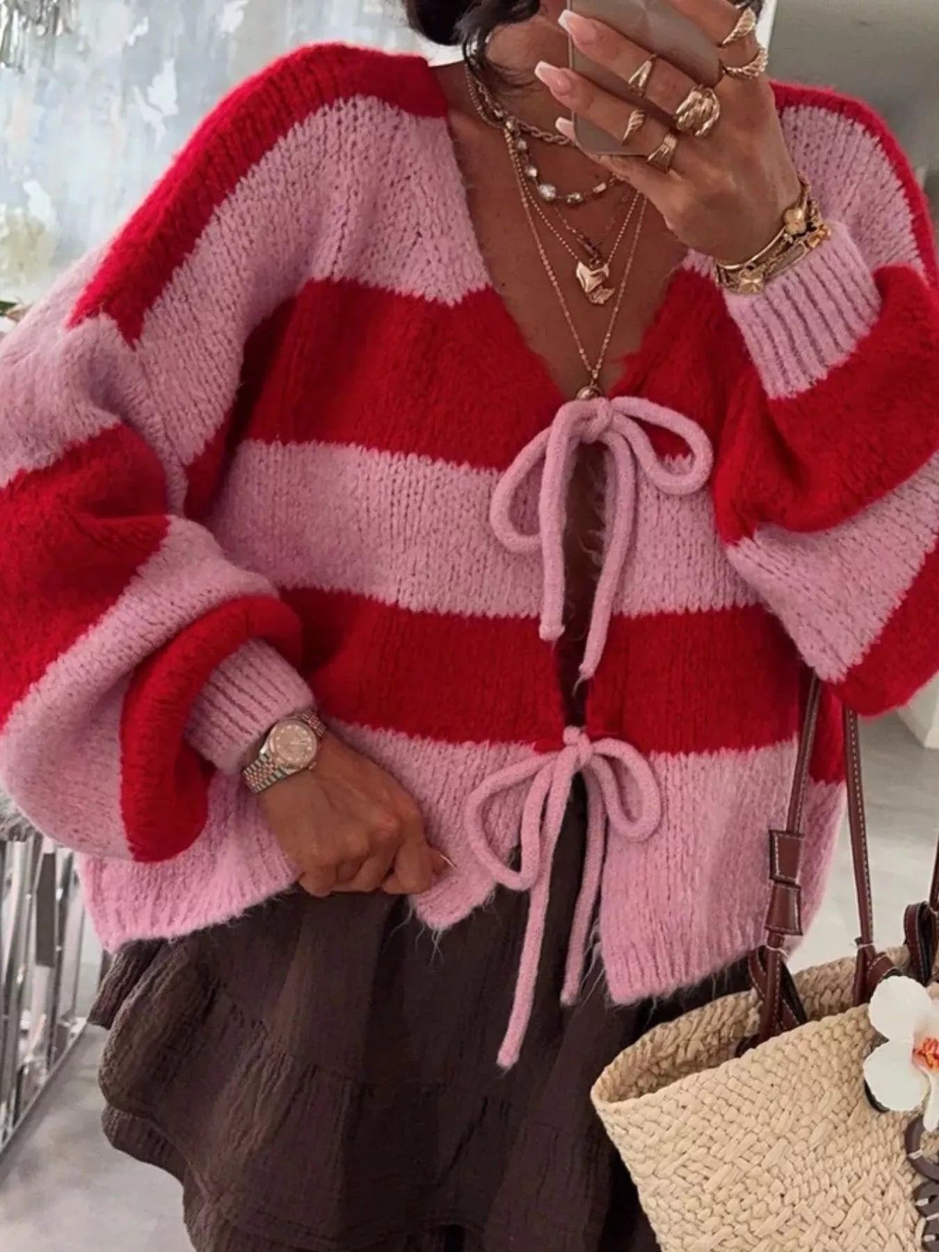 Striped tie-front cardigan in slightly stretchy polyester with long sleeves and a relaxed fit.