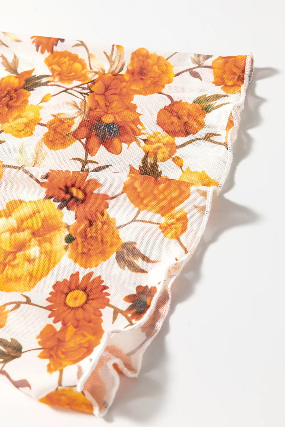 Flare sleeve mock neck top in slightly stretchy polyester with an elegant printed design.