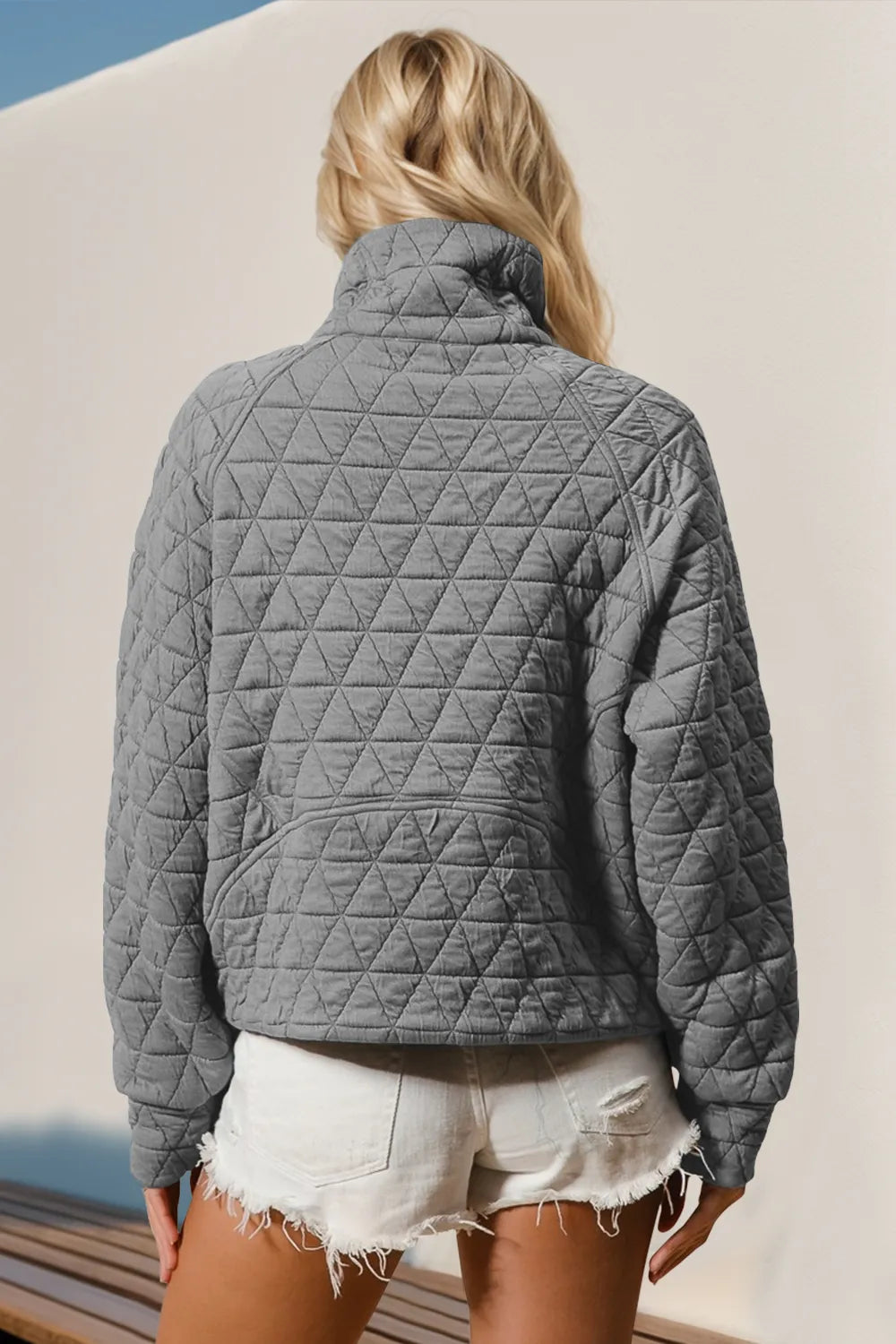 Trendsi Double Take quilted sweatshirt with half zip, long sleeves, and a sheer pocket detail