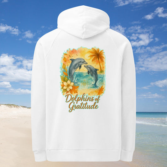 White Under Armour fleece hoodie with back print of leaping dolphins, tropical leaves, and "Dolphins of Gratitude" text.
